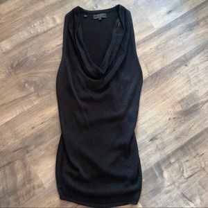 Guess black sweater tank top drops in the front.